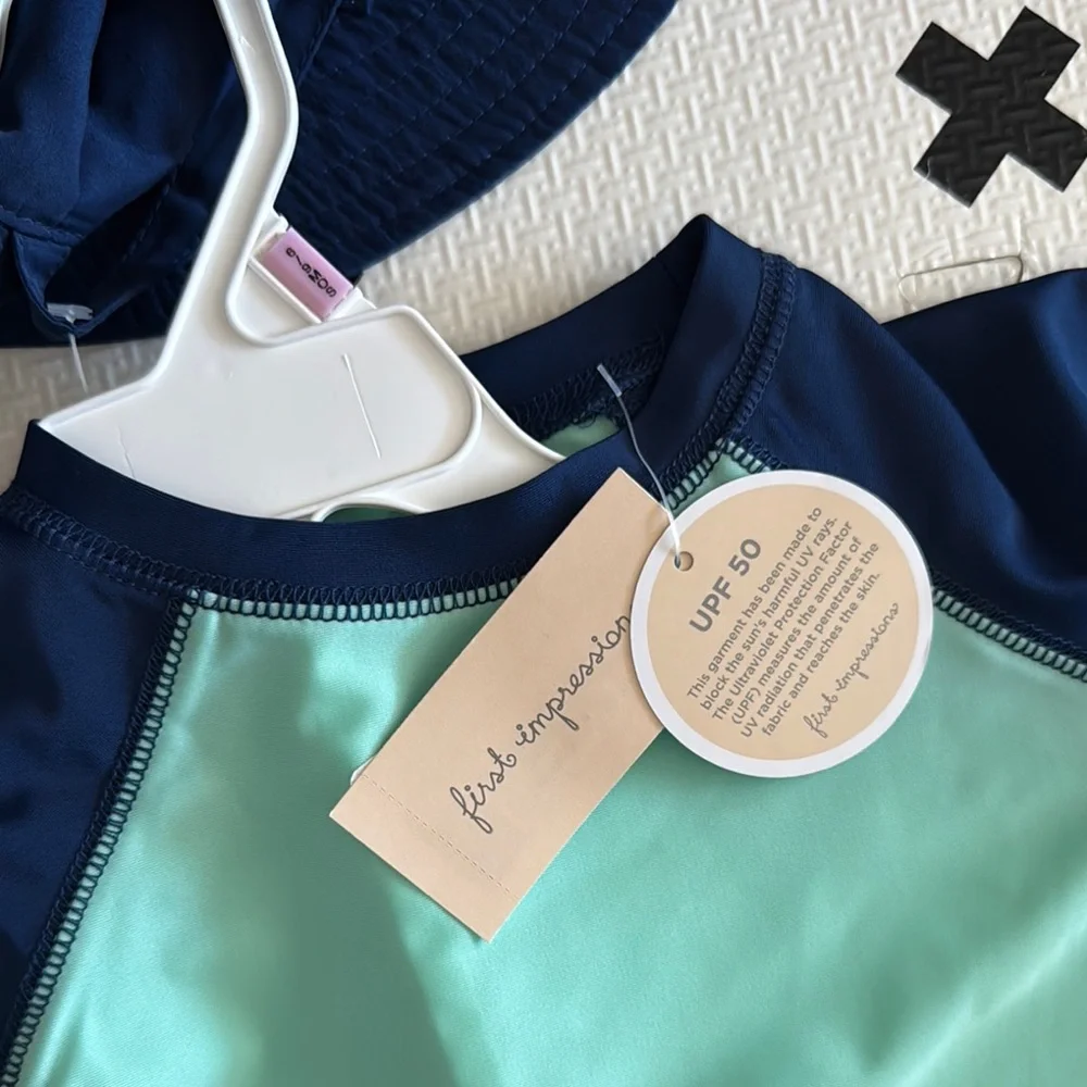 First impressions Kids Swim Set with Hat - Navy and Mint size 6-9m